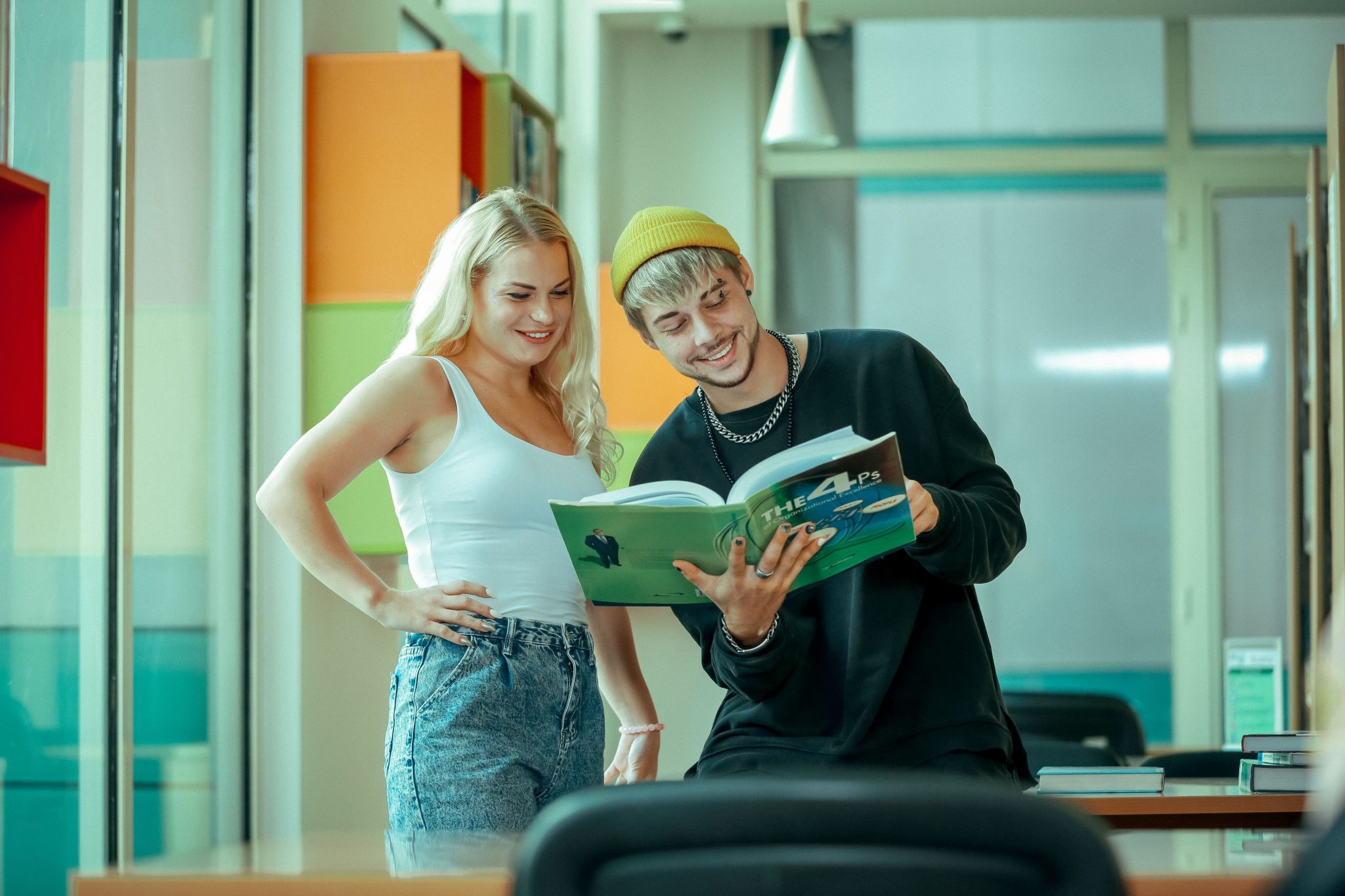 Two AUE Students studying together